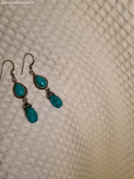 boucle d oreil avec un cayon