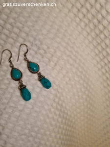 boucle d oreil avec un cayon