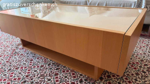 Couchtisch. Couchtisch 60 cm x 120 cm. Mit Glasplatte und Schubladen. Guter Zustand. Muss abgeholt werden.
