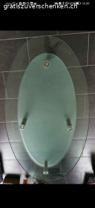 Glastisch mit Metallfüssen. Höhe: 50cm
Breite: 69cm
Länge: 128cm